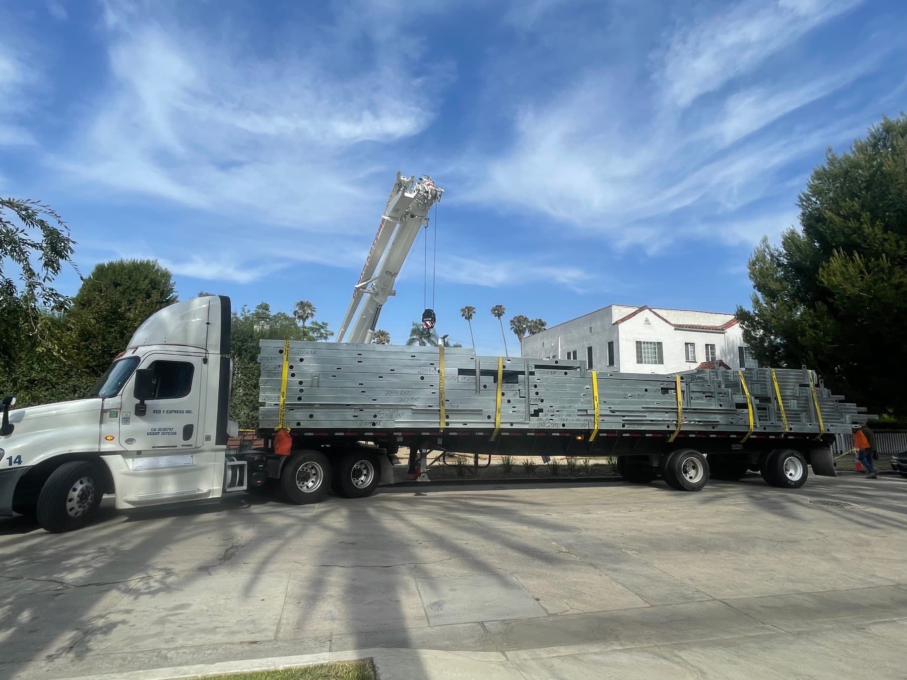 Panelized light-gauge steel wall panels delivered to an ADU build site